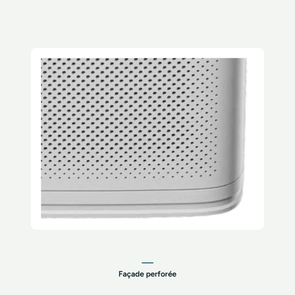 Gros plan sur la façade perforée et la base du purificateur d’air Nuvian